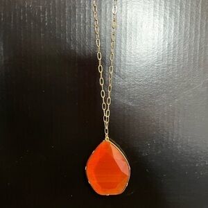 Elegant Gold Necklace with Orange Pendant